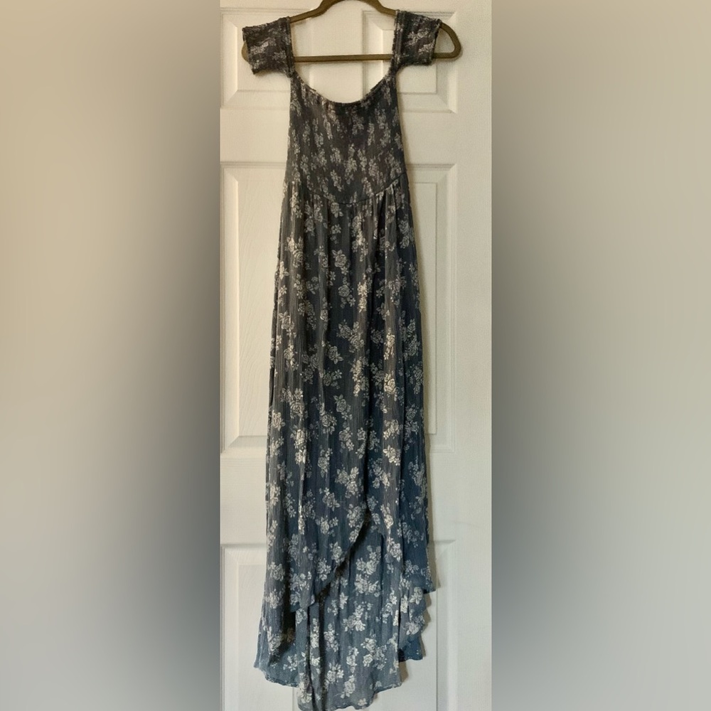 This Light Blue - Blue Rain dress embodies the essence of a serene summer day.